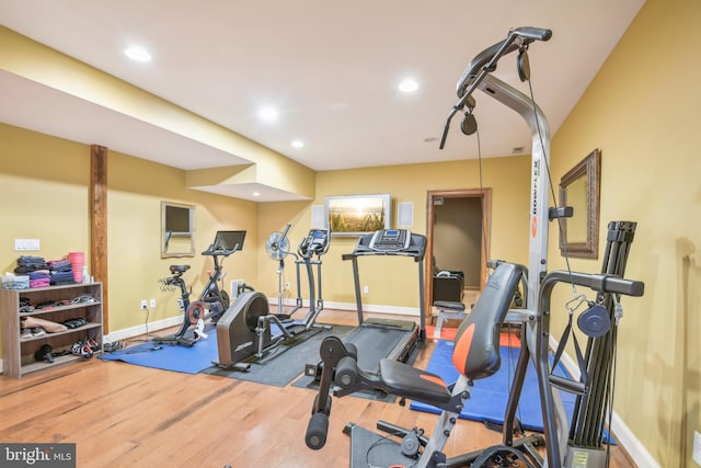 exercise area with hardwood / wood-style floors