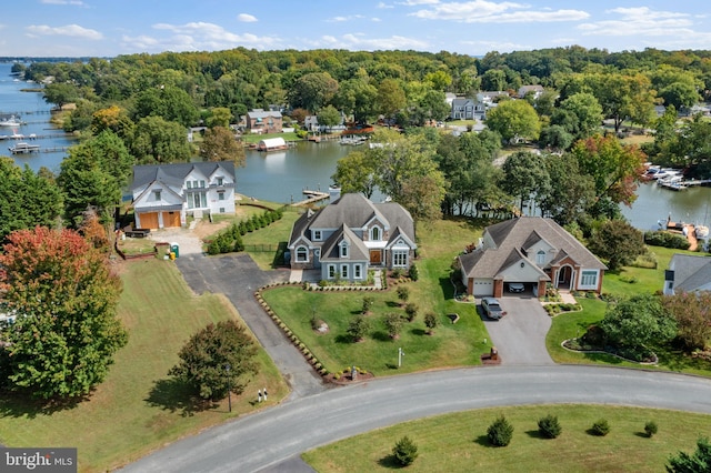 drone / aerial view with a water view