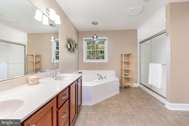 bathroom featuring vanity, tile patterned flooring, and plus walk in shower