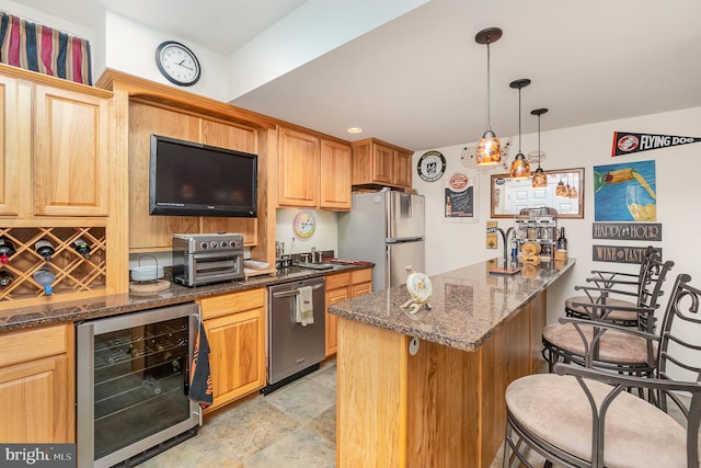 kitchen featuring a breakfast bar area, dark stone countertops, wine cooler, decorative light fixtures, and appliances with stainless steel finishes