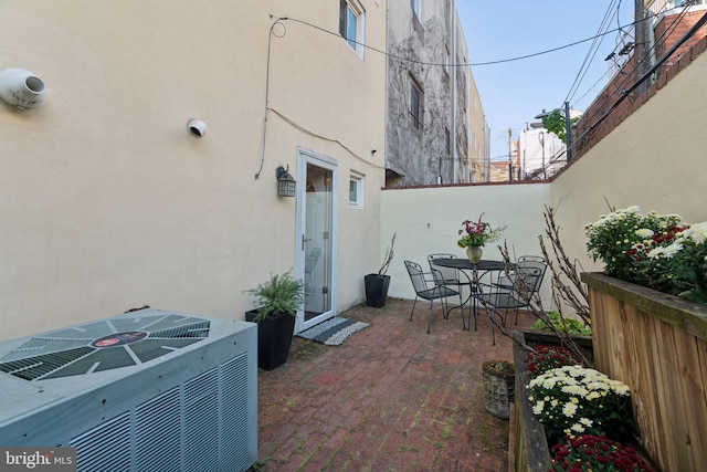 view of patio with central air condition unit