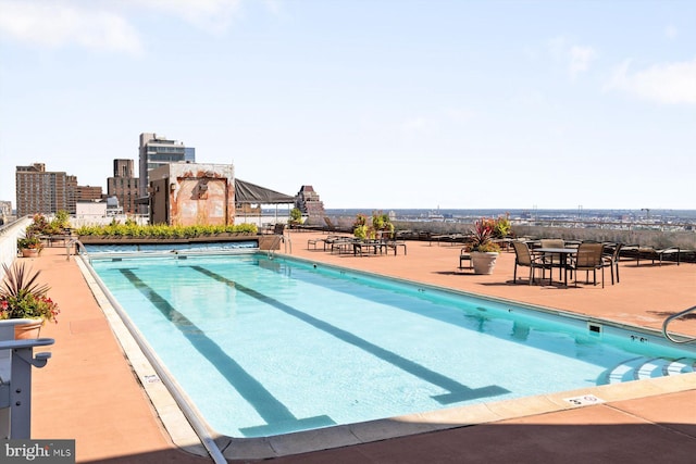 view of pool with a patio