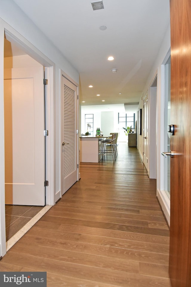 hall featuring hardwood / wood-style flooring