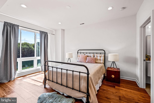 bedroom featuring hardwood / wood-style flooring