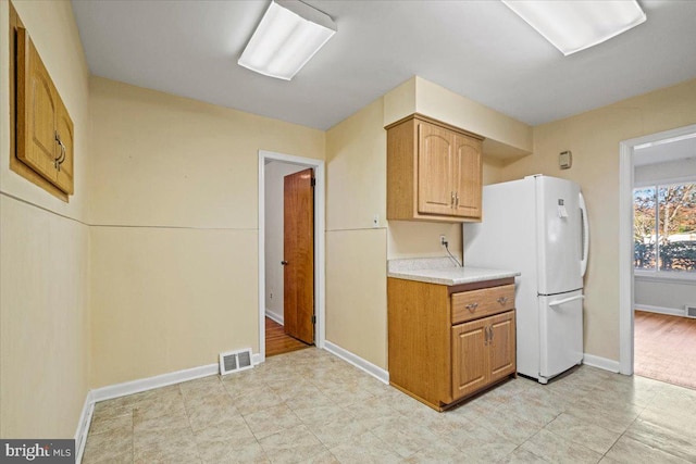 kitchen with white refrigerator