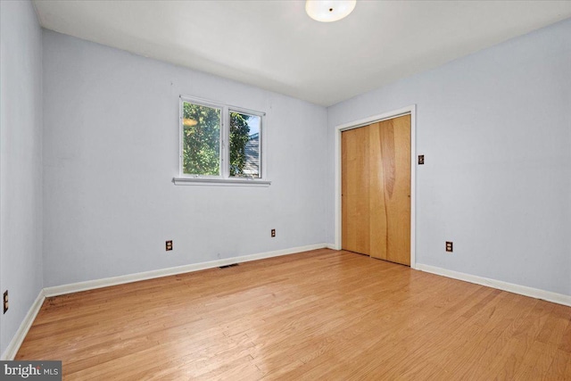 empty room featuring light hardwood / wood-style floors