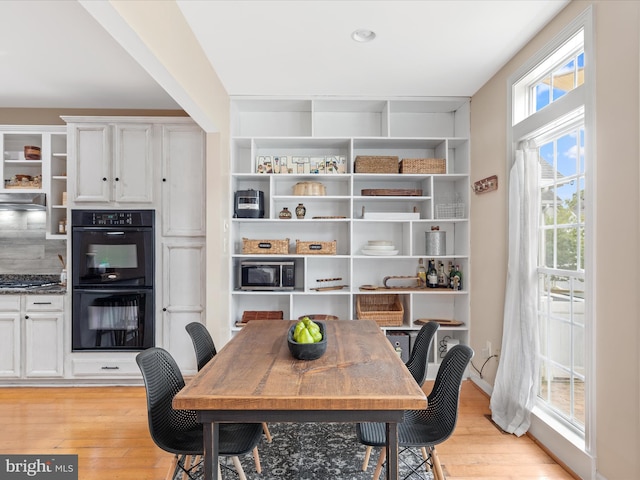 dining space featuring light hardwood / wood-style flooring