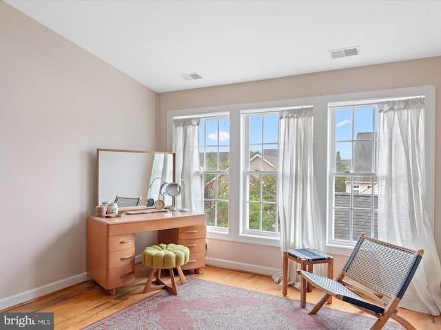 home office featuring light wood-type flooring and plenty of natural light