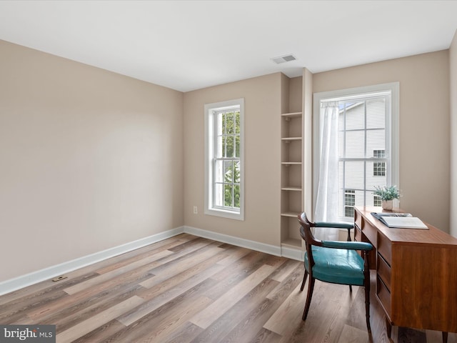 office area with light wood-type flooring