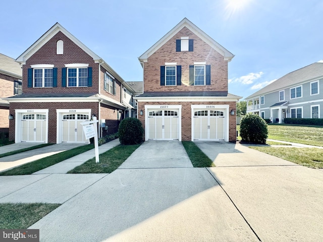 view of front of house with a garage and a front yard