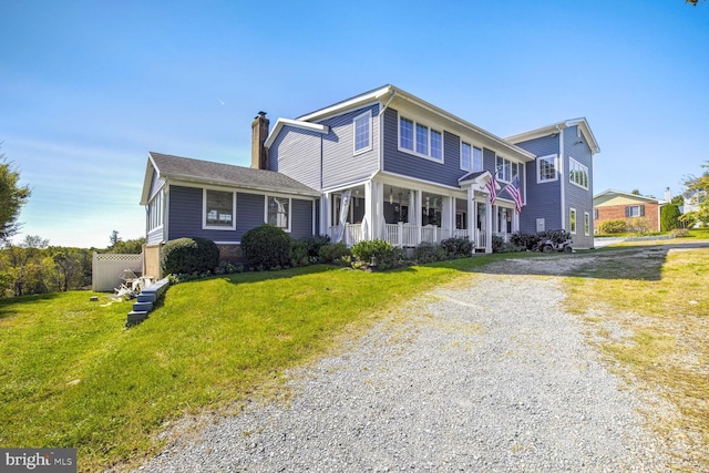 view of front of home with a front lawn