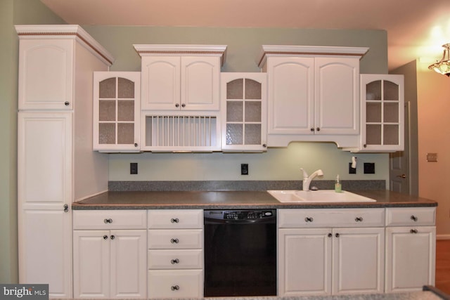 kitchen featuring white cabinets, dishwasher, and sink