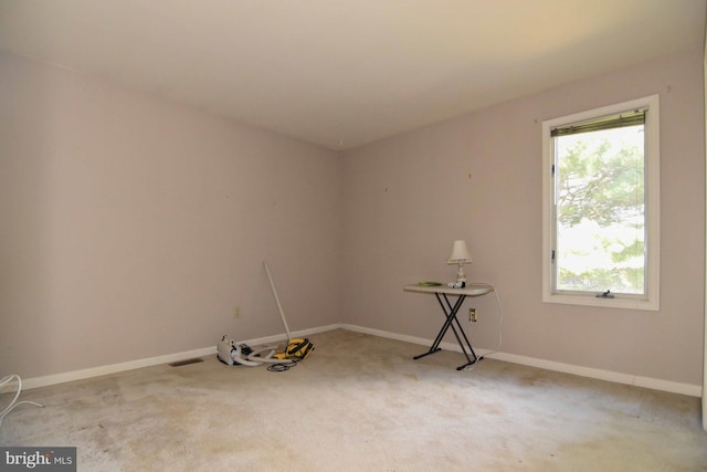 empty room featuring carpet floors