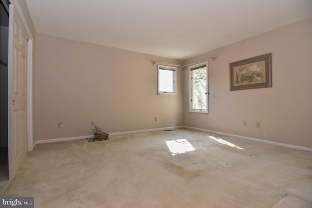 view of carpeted spare room