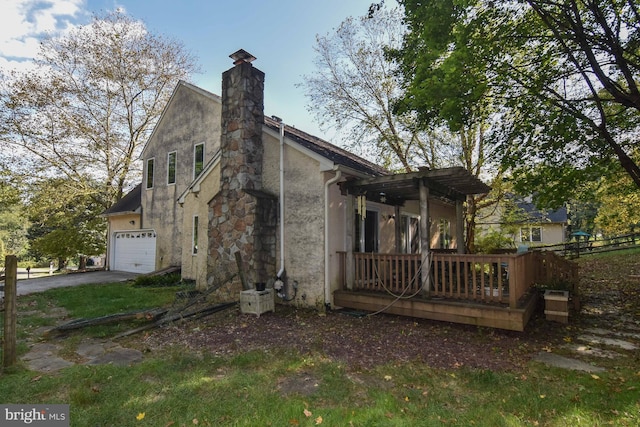 view of property exterior featuring a garage