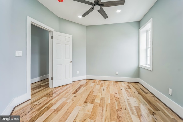 unfurnished bedroom with light wood-type flooring and ceiling fan