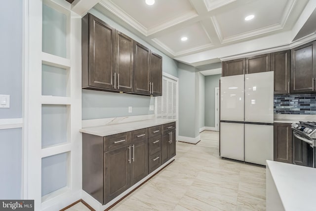 kitchen with electric stove, tasteful backsplash, white refrigerator, dark brown cabinets, and ornamental molding