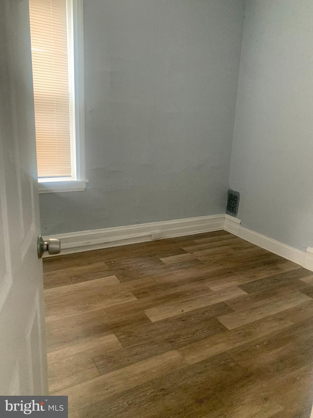 laundry room featuring hardwood / wood-style flooring