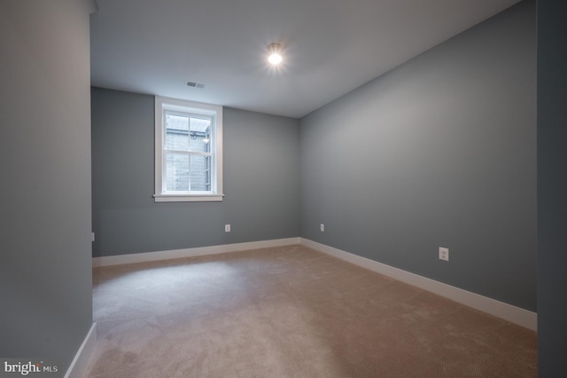 view of carpeted spare room