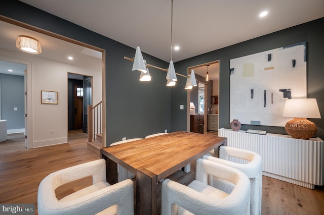 dining space featuring light hardwood / wood-style flooring