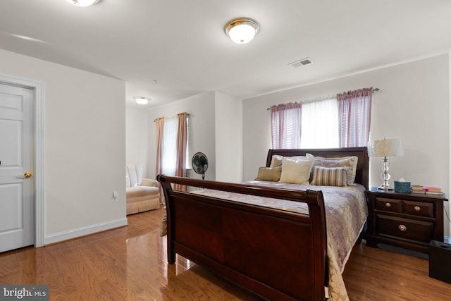 bedroom with light hardwood / wood-style floors