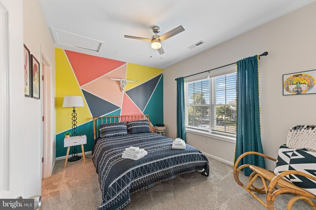 bedroom with ceiling fan and carpet floors