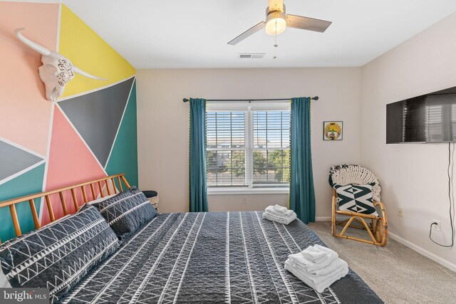 bedroom featuring ceiling fan and carpet floors