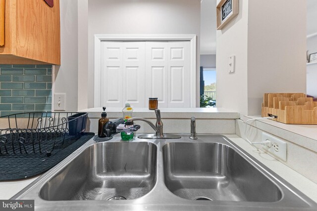 details with sink and tasteful backsplash