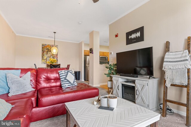 carpeted living room featuring crown molding