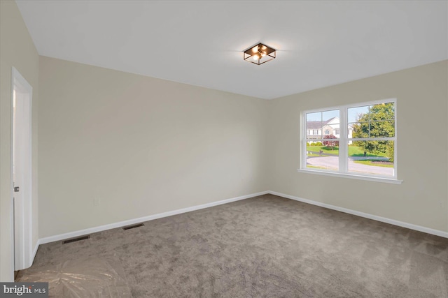 empty room with carpet floors