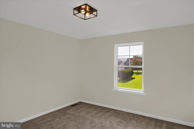 empty room featuring carpet