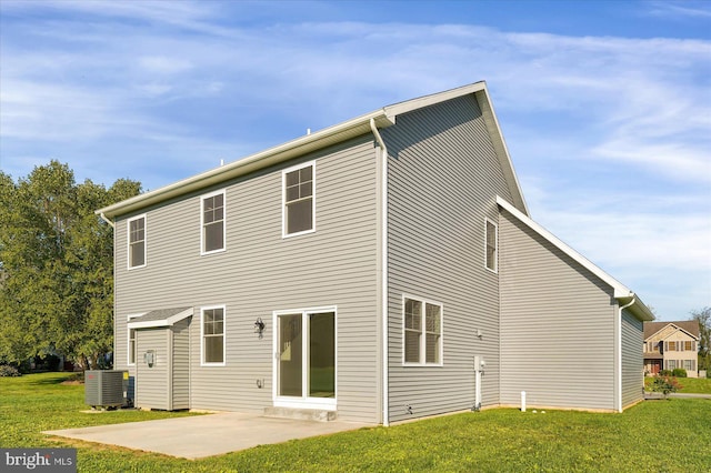 83 Landon Dr, Bellefonte, PA 16823 - back of property featuring a patio, central air condition unit, and a yard