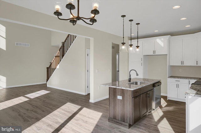 83 Landon Dr, Bellefonte, PA 16823 - kitchen featuring visible vents, dark wood-style floors, an inviting chandelier, white cabinets, and dishwasher