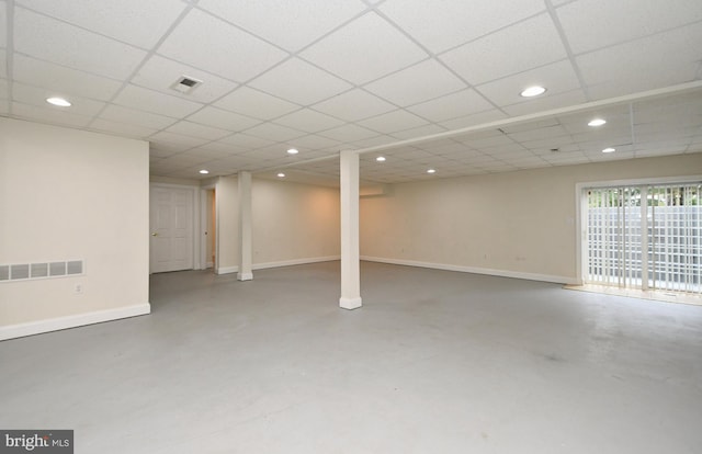 basement featuring a drop ceiling