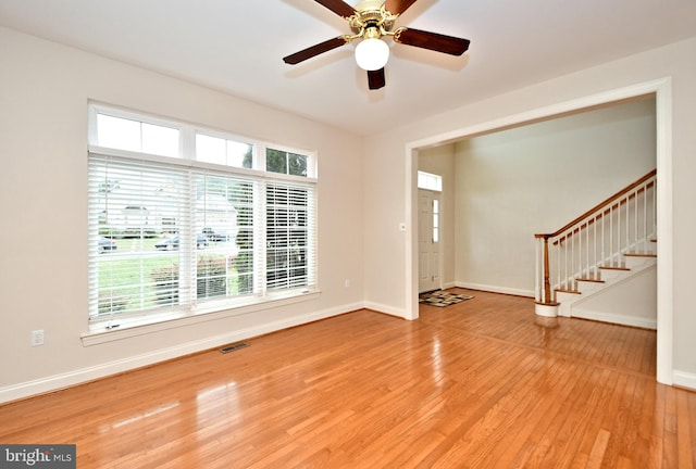 entrance foyer featuring light wood-type flooring and ceiling fan