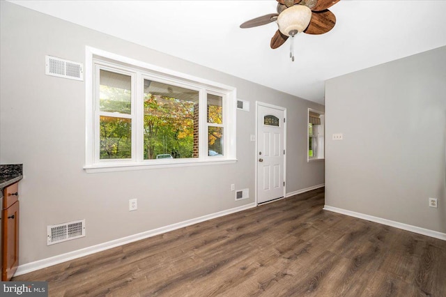 entryway featuring ceiling fan and dark hardwood / wood-style flooring