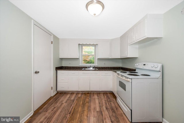 kitchen with electric stove, white cabinetry, dark wood-type flooring, and sink