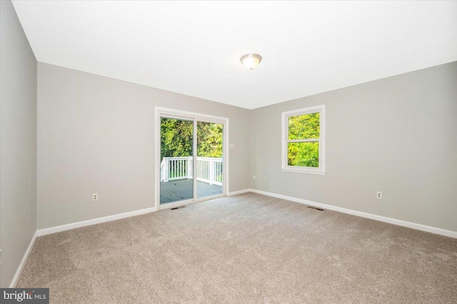 view of carpeted spare room