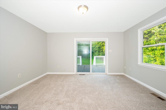 view of carpeted spare room