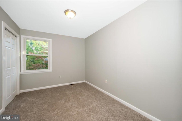 view of carpeted spare room