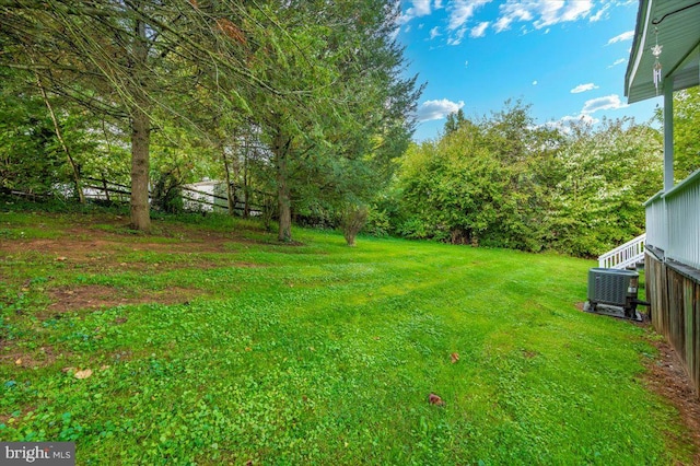 view of yard featuring central AC unit