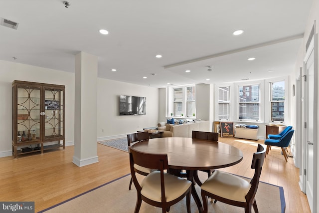 dining room featuring light hardwood / wood-style flooring