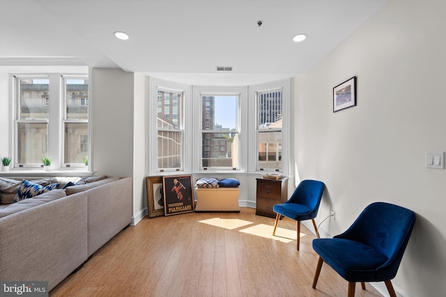 sitting room with light hardwood / wood-style floors