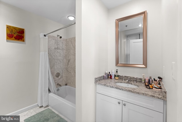 bathroom with vanity and shower / tub combo with curtain