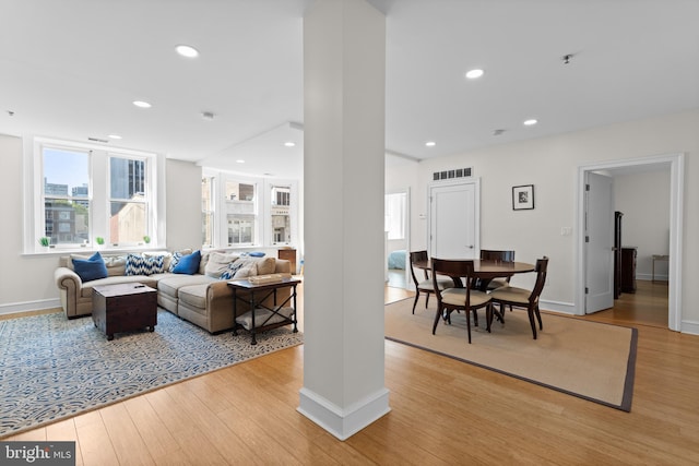 dining room with light hardwood / wood-style flooring