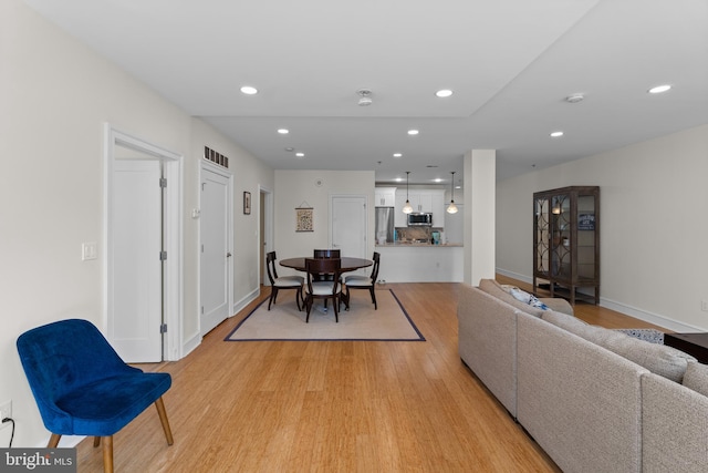 living room featuring light wood-type flooring