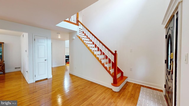 entrance foyer featuring hardwood / wood-style floors