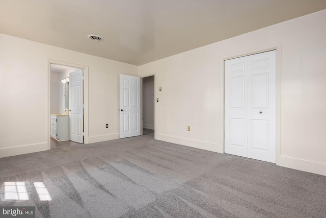 unfurnished bedroom with carpet