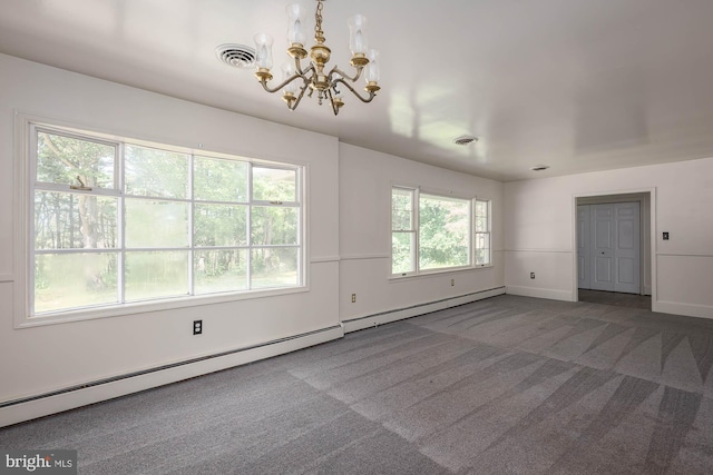 spare room featuring an inviting chandelier, dark carpet, and baseboard heating