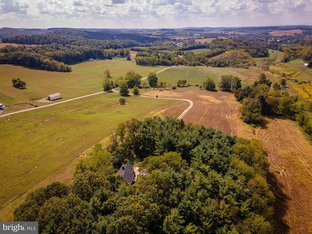 birds eye view of property featuring a rural view